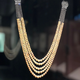 Pearl and diamond necklace by Cartier.